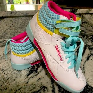 Hi top sneakers. Never worn. In box